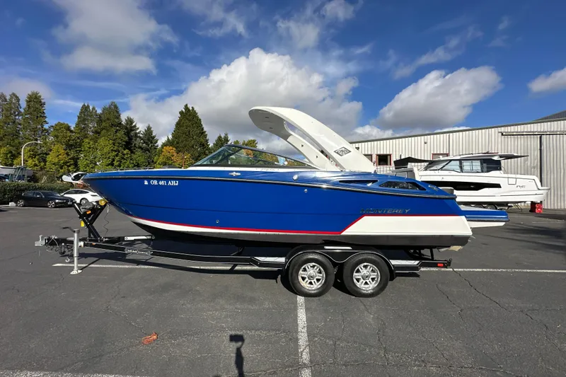 Slide: The Image of 2019 Monterey 278SS Super Sport boat on trailer in parking lot. - 1
