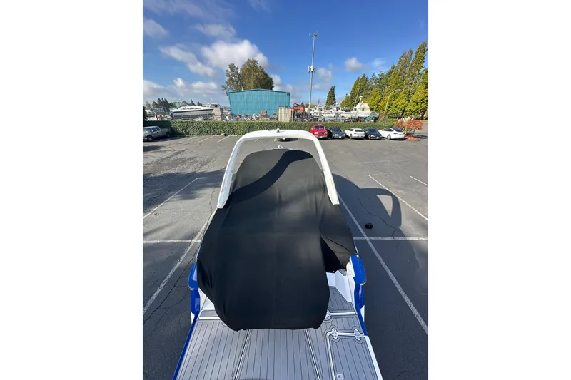 Slide: The Image of 2019 Monterey 278SS Super Sport boat with spacious seating and American flag. - 11