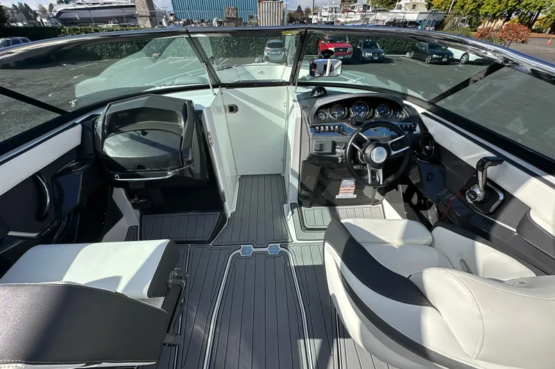 Slide: The Image of 2019 Monterey 278SS Super Sport boat interior with seating and storage compartments. - 16