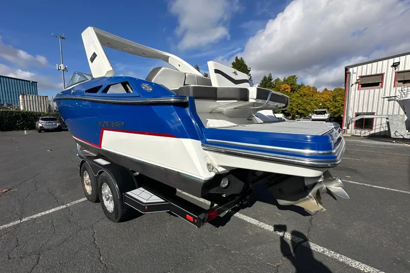 Slide: The Image of 2019 Monterey 278SS Super Sport boat propeller and drive system in a parking lot. - 3