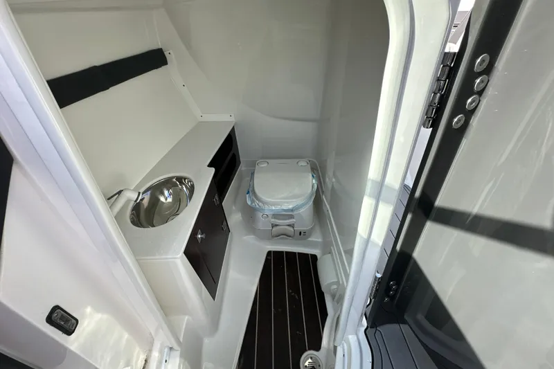 Slide: The Image of 2019 Monterey 278SS Super Sport boat bathroom with sink and toilet. - 34