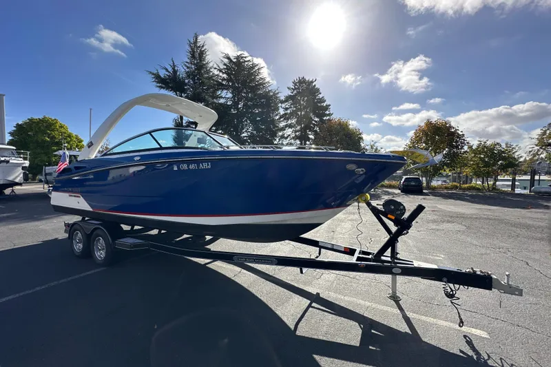 Slide: The Image of 2019 Monterey 278SS Super Sport boat on trailer, rear view with American flag. - 6