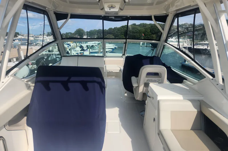 Slide: The Image of Interior view of 2021 Boston Whaler 280 Vantage boat at marina. - 4
