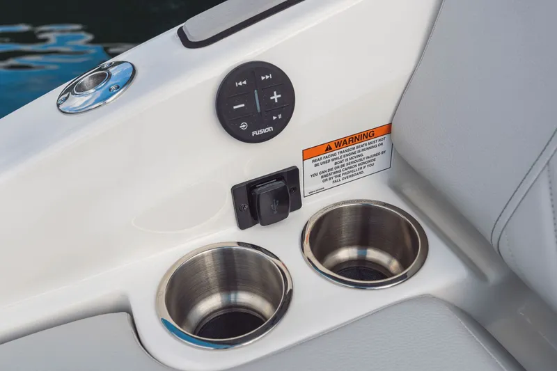 Slide: The Image of Close-up of Sea Ray SDX 250 2026 with cup holders and controls. - 46