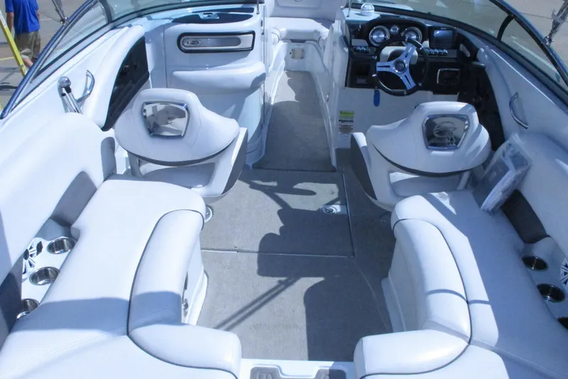Slide: The Image of Steering console of 2017 Crownline 255 SS boat with gauges and controls. - 5