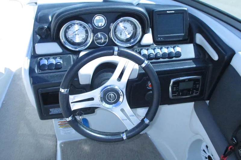 Slide: The Image of 2017 Crownline 255 SS boat interior with spacious seating and modern design. - 6