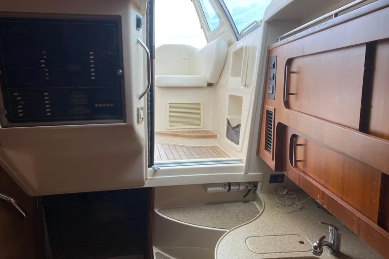 Slide: The Image of Interior view of 2012 Grady-White Express 360 boat, featuring cabin and cockpit area. - 21