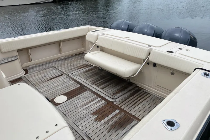 Slide: The Image of 2012 Grady-White Express 360 boat with spacious deck and seating area. - 23