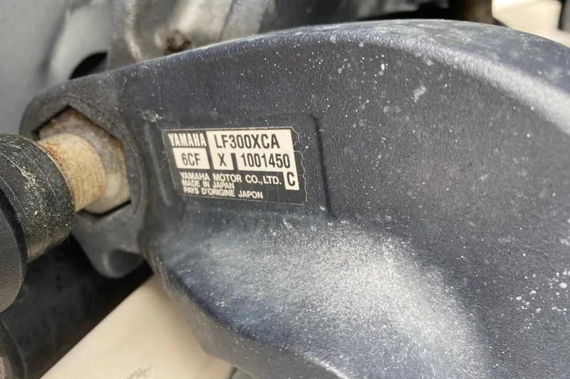 Slide: The Image of Close-up of Yamaha LF300XCA engine label on 2012 Grady-White Express 360 boat. - 26