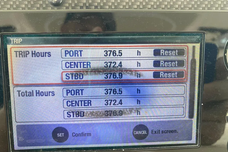 Slide: The Image of Display screen showing trip and total hours for Grady-White Express 360, 2012 model. - 8