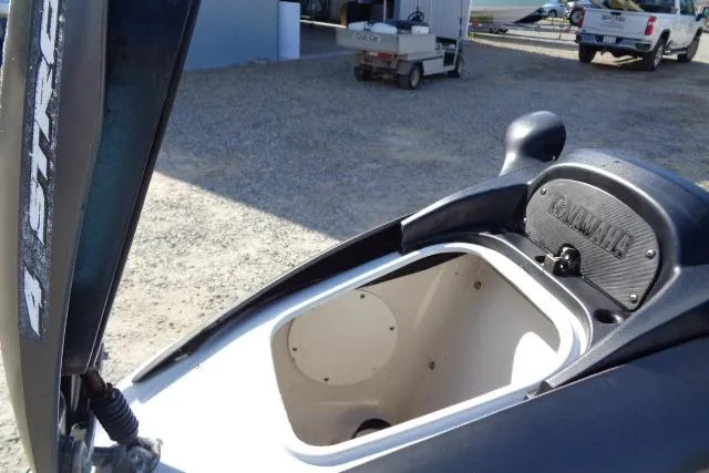 Slide: The Image of 2004 Yamaha WaveRunner FX Cruiser storage compartment open, showing interior space. - 9