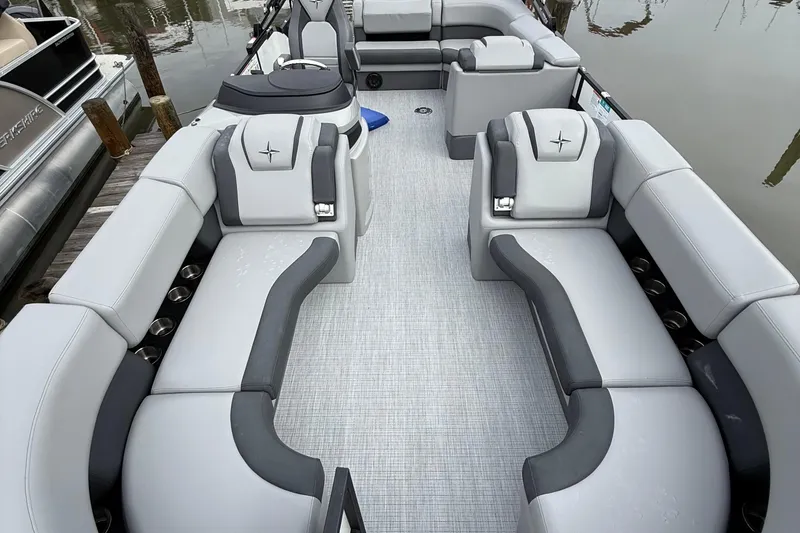 Slide: The Image of 2026 Berkshire 23CL STS pontoon boat for sale, displayed on a trailer. - 3