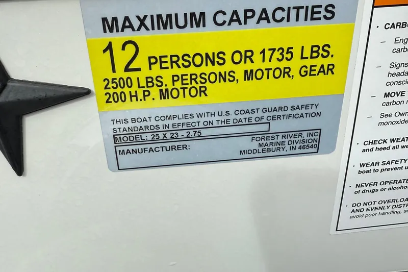 Slide: The Image of 2026 Berkshire 23CL STS Saltwater Edition pontoon boat with canopy, side view. - 6