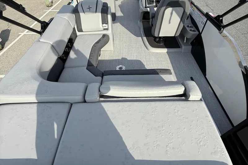 Slide: The Image of 2026 Berkshire 23CL STS boat interior with gray seating and modern design. - 9