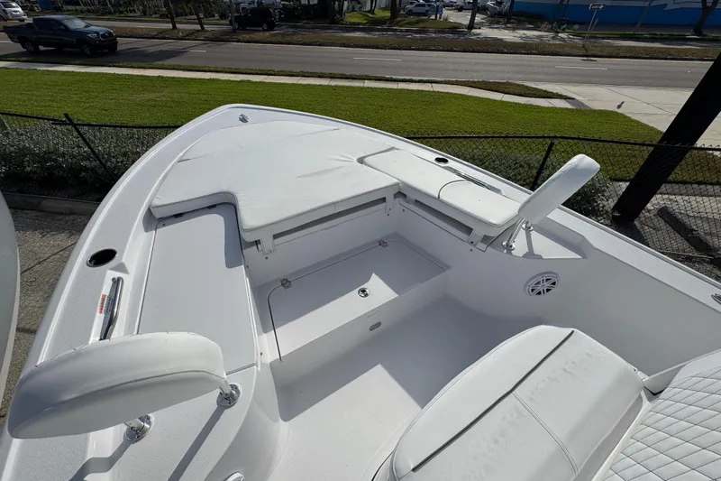 Slide: The Image of 2026 Sportsman Masters 227 Bay Boat with spacious seating and storage compartments. - 13