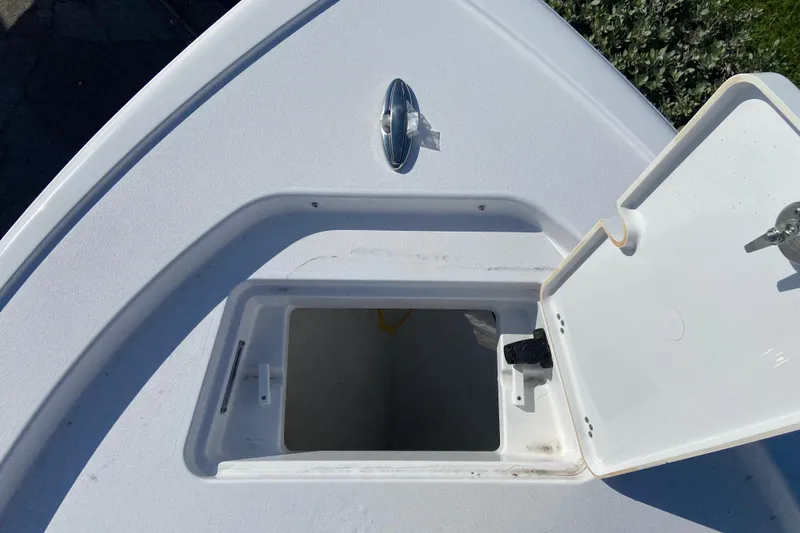 Slide: The Image of Open storage compartment on 2026 Sportsman Masters 227 Bay Boat deck. - 20