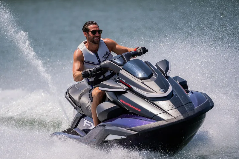 Slide: The Image of Manufacturer Provided Image: Man riding 2026 Yamaha WaveRunner FX SVHO on water, creating splashes. - 1