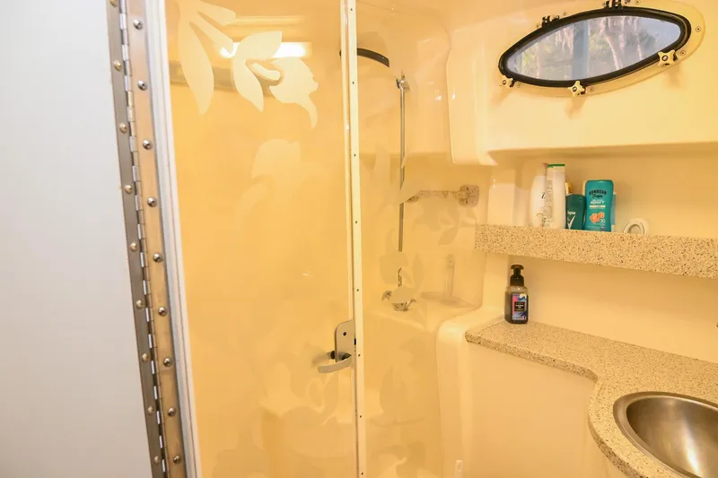 Slide: The Image of Bathroom interior of 2000 Rinker Fiesta Vee 330 yacht with shower and sink. - 40