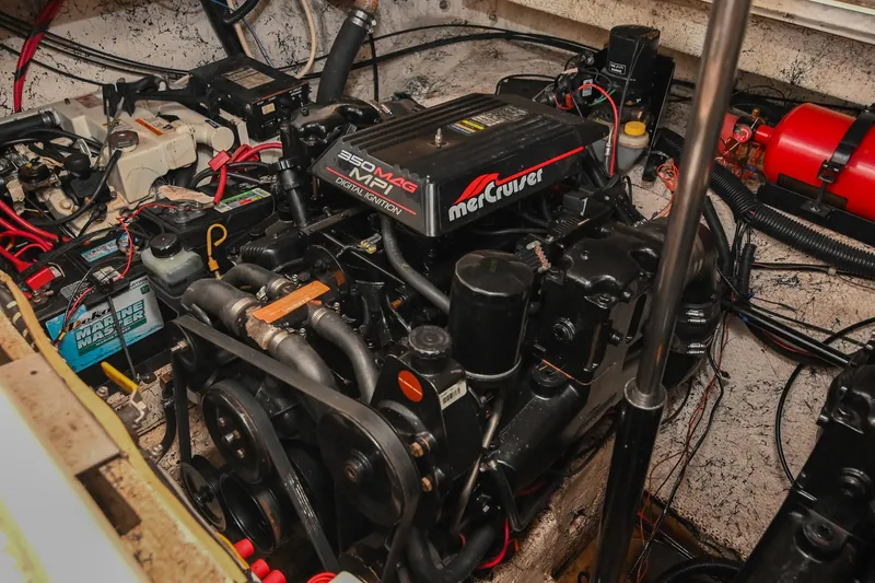 Slide: The Image of Engine compartment of 2000 Rinker Fiesta Vee 330 with MerCruiser 350 MAG MPI engine. - 47