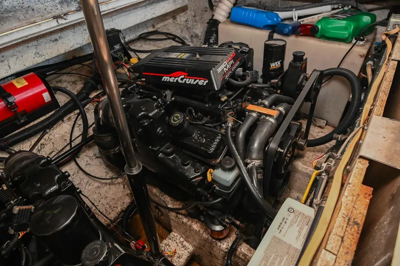 Slide: The Image of Engine compartment of 2000 Rinker Fiesta Vee 330 with MerCruiser engine. - 48