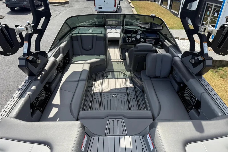 Slide: The Image of 2018 Nautique Super Air Nautique G23 interior with gray seating and modern design. - 13