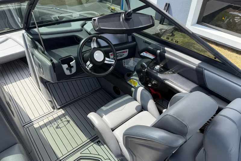 Slide: The Image of 2018 Nautique Super Air Nautique G23 interior with sleek design and modern controls. - 15