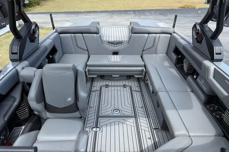 Slide: The Image of 2018 Nautique Super Air Nautique G23 interior with gray seating and sleek design. - 22