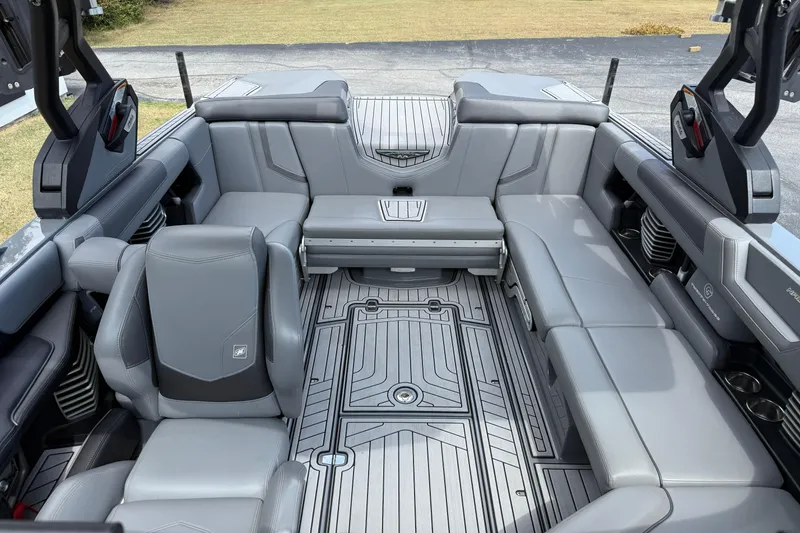 Slide: The Image of 2018 Nautique Super Air Nautique G23 interior with gray seating and modern design. - 23