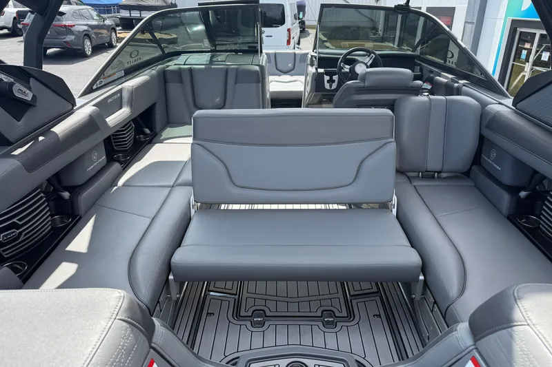 Slide: The Image of 2018 Nautique Super Air Nautique G23 interior with gray seating and modern design. - 26