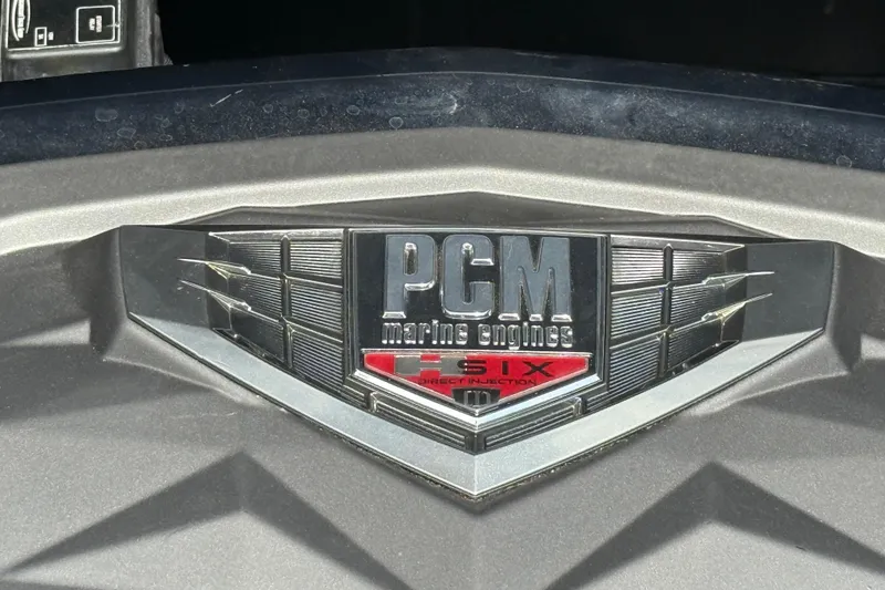 Slide: The Image of PCM Marine Engines emblem on 2018 Nautique Super Air Nautique G23. - 35