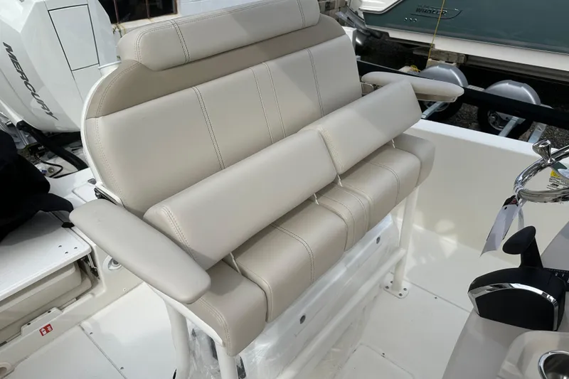 Slide: The Image of 2026 Boston Whaler 250 Dauntless boat seating and steering area. - 7