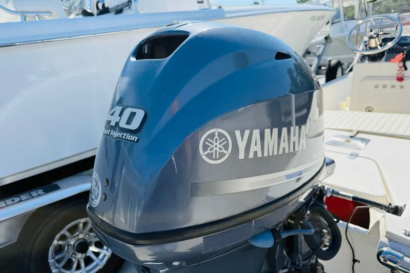 Slide: The Image of Yamaha 40HP outboard motor on 2019 Carolina Skiff JV17CC boat, showcasing fuel injection technology. - 7