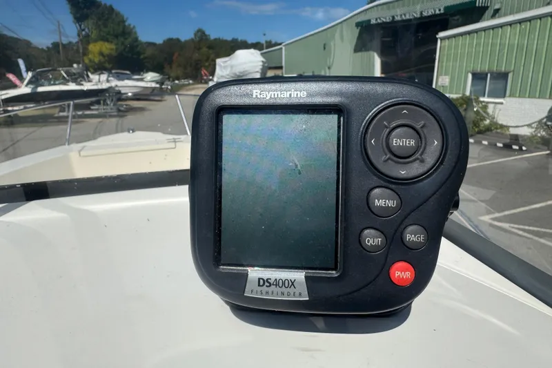 Slide: The Image of Raymarine DS400X fishfinder on 2002 Seahunt Triton 202 boat dashboard. - 9