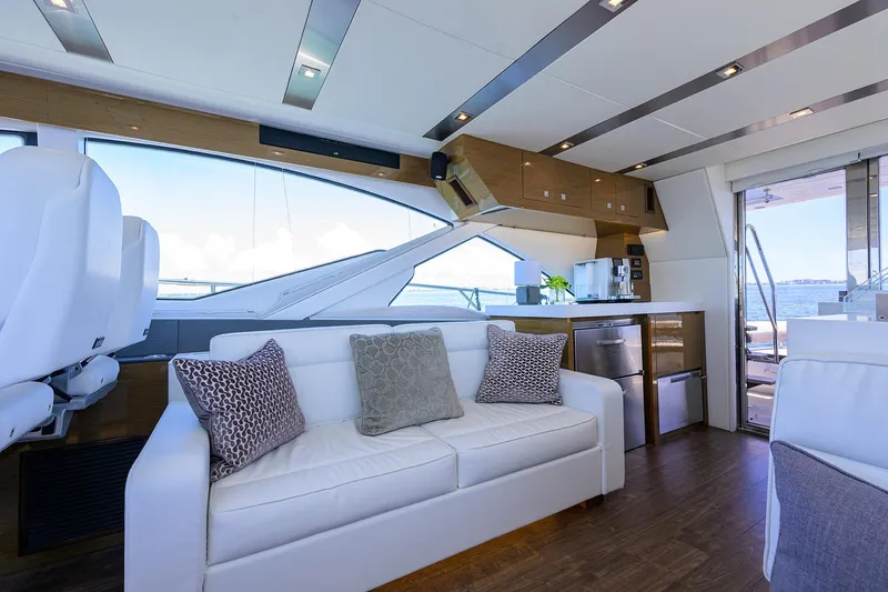 Slide: The Image of Luxurious interior of 2018 Cruisers 60 Cantius Fly yacht with modern furnishings and ocean view. - 26