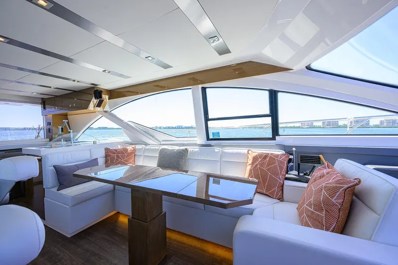Slide: The Image of Luxurious interior of 2018 Cruisers 60 Cantius Fly yacht with elegant seating and scenic views. - 31