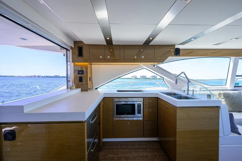 Slide: The Image of Luxurious kitchen interior of 2018 Cruisers 60 Cantius Fly yacht with ocean view. - 41
