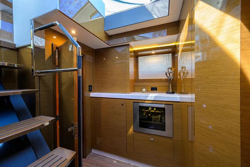 Slide: The Image of Luxurious interior of 2018 Cruisers 60 Cantius Fly yacht with modern kitchen design. - 46