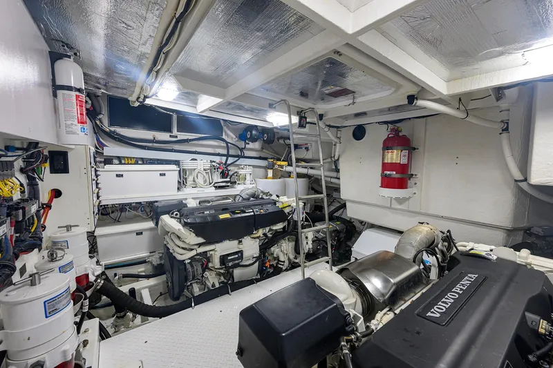 Slide: The Image of Engine room of 2018 Cruisers 60 Cantius Fly yacht with Volvo Penta engines. - 60
