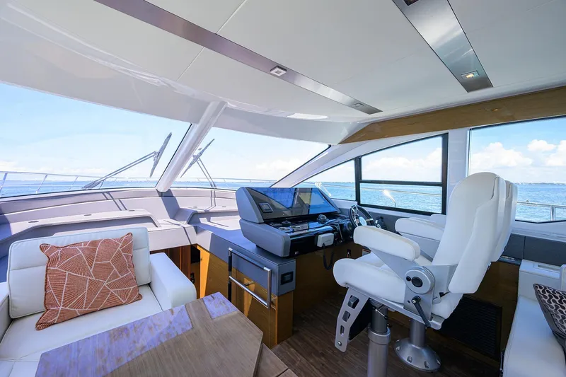 Slide: The Image of Luxurious interior of 2018 Cruisers 60 Cantius Fly yacht with modern helm and seating. - 32
