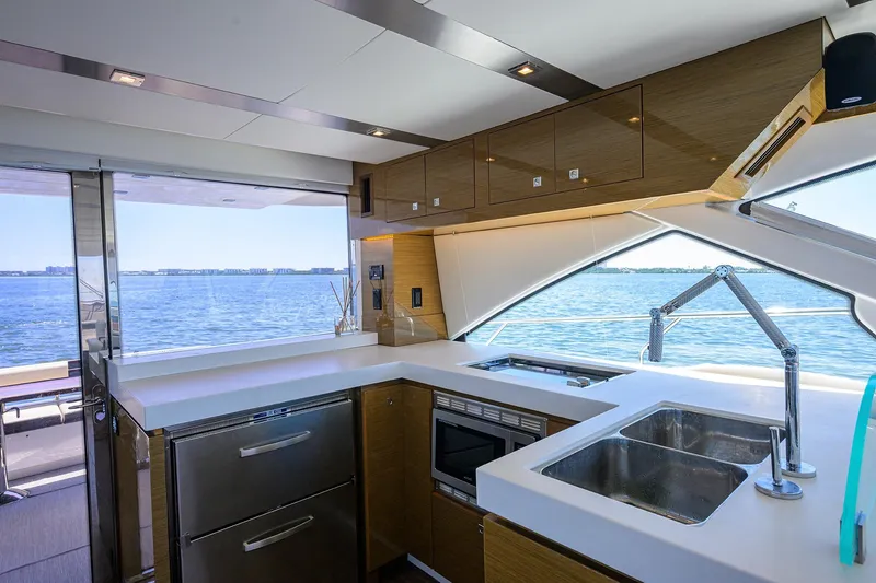 Slide: The Image of Luxurious kitchen interior of 2018 Cruisers 60 Cantius Fly yacht with ocean view. - 42