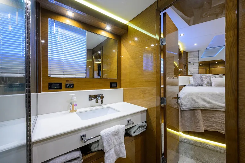 Slide: The Image of Luxurious bathroom and bedroom interior of 2018 Cruisers 60 Cantius Fly yacht. - 49