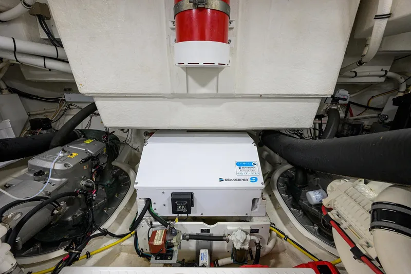 Slide: The Image of Engine room of 2018 Cruisers 60 Cantius Fly with Seakeeper 9 stabilizer system. - 63
