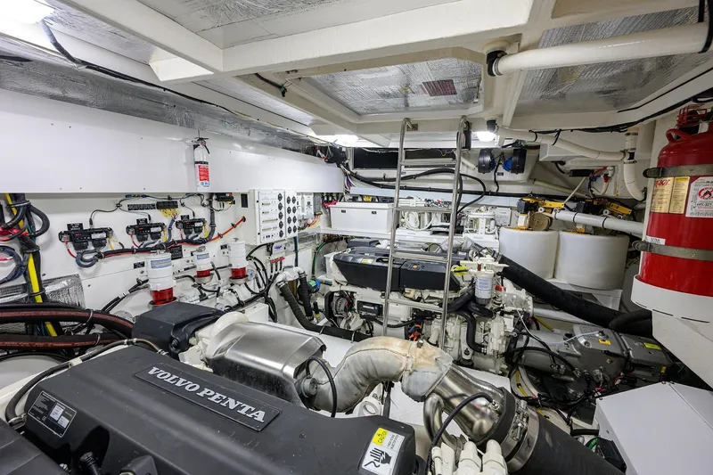 Slide: The Image of Engine room of 2018 Cruisers 60 Cantius Fly yacht with Volvo Penta engines. - 64