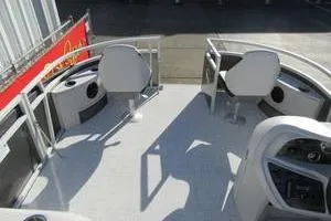 Slide: The Image of 2025 South Bay 16 FC SE boat interior with seating and control panel. - 17