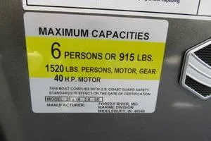 Slide: The Image of Maximum capacity label for South Bay 16 FC SE, 2025: 6 persons or 915 lbs, 40 HP motor. - 18