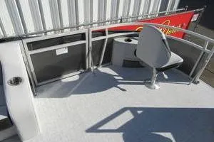 Slide: The Image of 2025 South Bay 16 FC SE pontoon boat deck with seating and railing. - 8