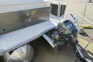 Slide: The Image of 2025 South Bay 16 FC SE pontoon boat with 25 HP outboard motor. - 9