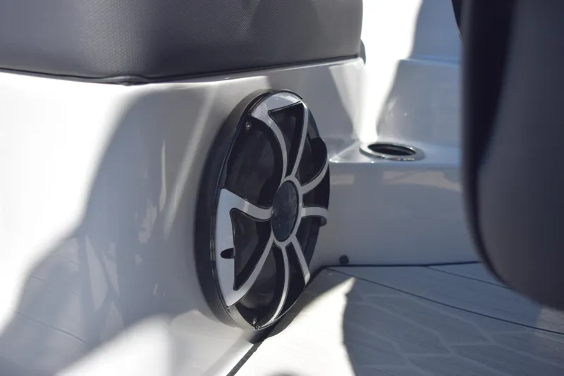 Slide: The Image of 2024 Yamaha Boats 222XD speaker detail on white interior. - 22