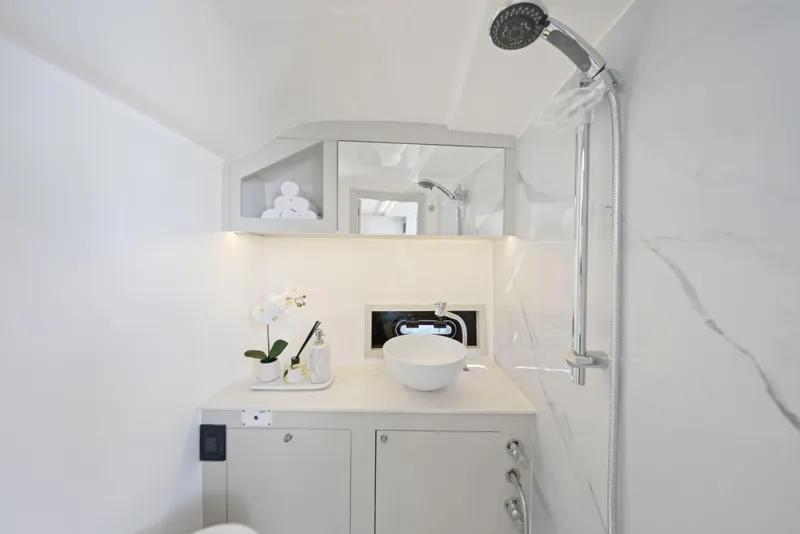 Slide: The Image of Luxurious bathroom in 2025 Valiatt 380 Bowrider boat with modern fixtures and elegant design. - 23