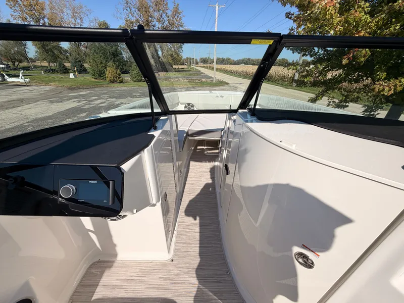 Slide: The Image of The image shows the cockpit of a 2026 Sea Ray SDX 270 with a modern design. - 55